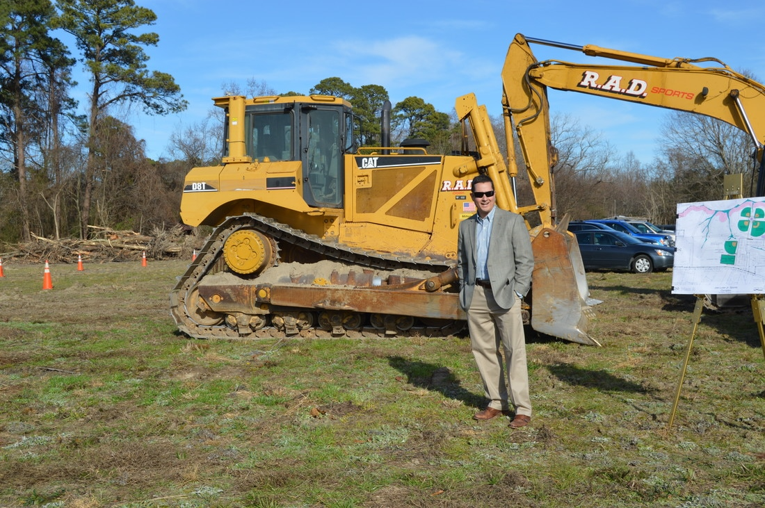 Person Posing with Excavator 1