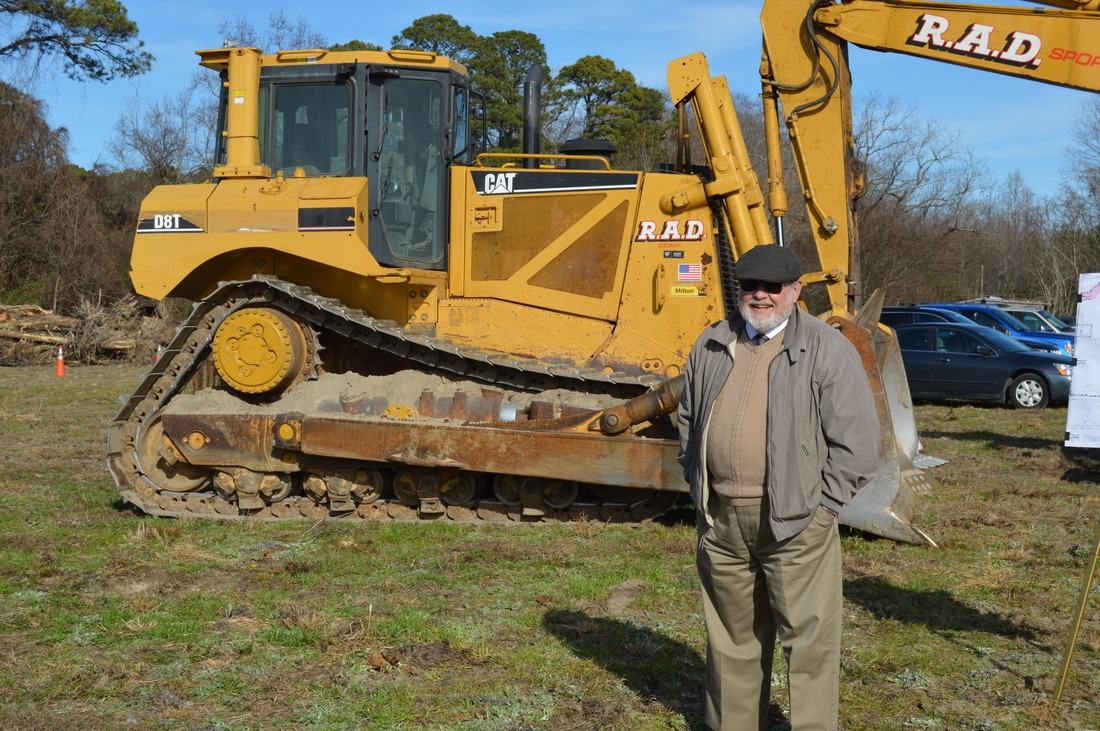 Person Posing with Excavator 2